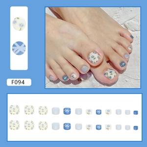 F094 floral toe press-on nails set with blue bows and solid light blue patterns