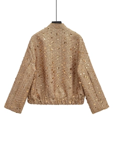 Detailed back view of women's sequined tweed jacket with golden metallic finish