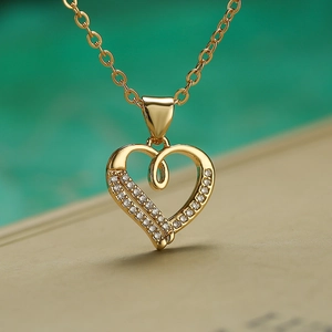 Elegant gold plated heart pendant necklace with shimmering cubic zirconia accents for women