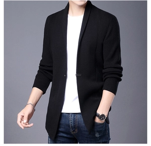 Close-up of premium black knit blazer cardigan for men showing fine fabric texture