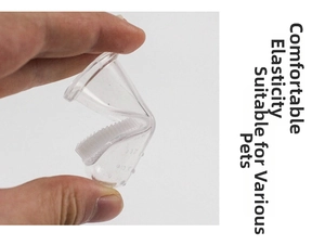 Macro shot of transparent silicone pet finger toothbrush with soft bristles for oral care