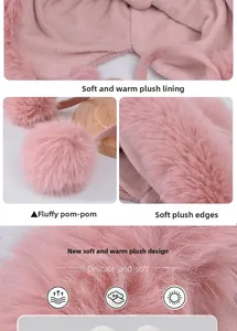 Detailansicht der rosa Strickmütze mit dickem Plüschfutter und weichen Bommel-Details