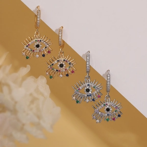 Luxurious gold and silver devil eye drop earrings with sparkling cubic zirconia accents