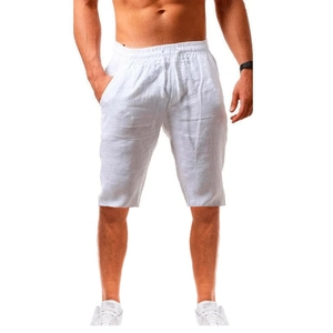 Detail of white cotton linen summer shorts showing waist drawstring and natural texture