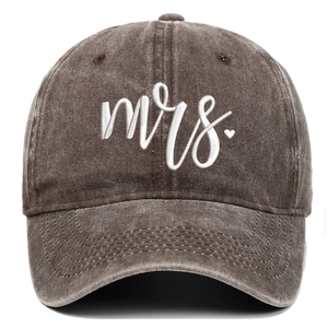 Close-up of vintage washed cotton baseball cap with white Mrs. heart embroidery detail