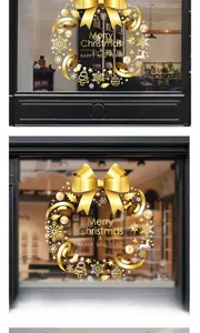 Close-up of golden Merry Christmas wreath window sticker with reindeer and snowflake details