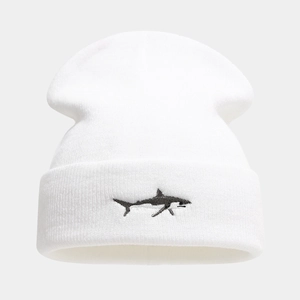 White knitted beanie with shark embroidery and a cuffed design for winter warmth