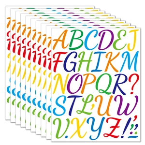 Macro shot of 2-inch colorful vinyl alphabet stickers featuring A-Z letters and symbols