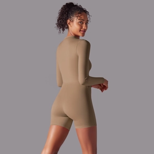 Slim fit khaki long sleeve bodysuit romper showing back contour and premium knit fabric