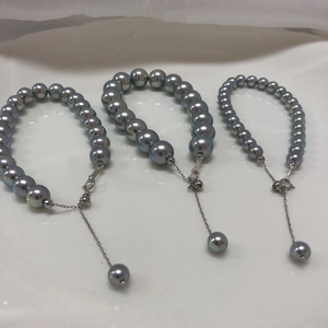 Macro shot of gray-blue pearl bracelets with S925 silver clasp and adjustable chain