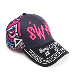 Contrast baseball cap with pink SWAG embroidery and patterned side panels on blue fabric