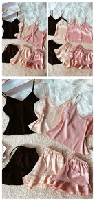 Detail view of silk satin pajama sets with camisole top and ruffled shorts in multiple colors