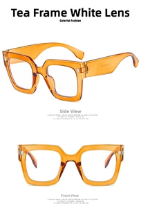 Detail view of tea-colored square frames with polished metal hinges and clear lenses