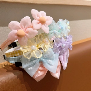 Kids lace bow headbands with floral designs and non-slip grip for young girls