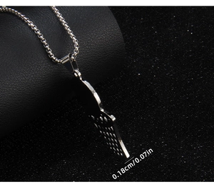 Side view detail of silver basketball hoop pendant showing 0.18cm thickness and texture