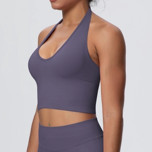 Close-up of deep purple seamless ribbed halter yoga bra with supportive wide waistband