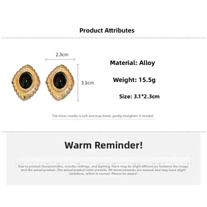 Detailed view of vintage gold flower oval earrings with size dimensions 3.1cm by 2.3cm