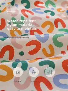 Close-up of waterproof nylon fabric with colorful polka dots for folding shopping bags