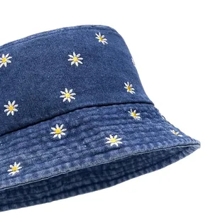 Blue denim bucket hat with daisy embroidery and sun protection wide brim for women