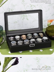 Detailansicht einer Uhrenbox für 12 Uhren aus schwarzem Lychee-Leder mit Glasdeckel und Verschluss