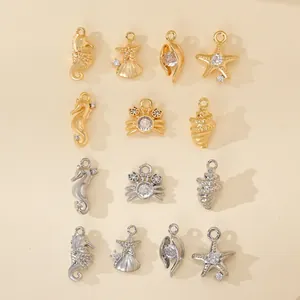 Assorted gold and silver ocean animal charms with cubic zirconia for DIY jewelry making