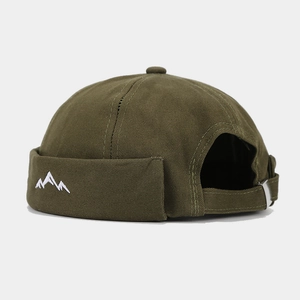 Dark green brimless docker hat with mountain embroidery and silver adjustable metal buckle