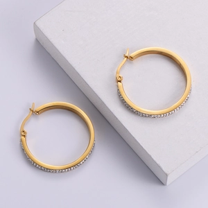 Minimalist golden round hoop earrings with sparkling white crystals for women