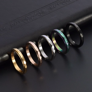 Minimalist 18K gold stainless steel spinning ring with rhombus faceted surface in five colors