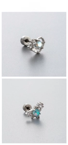 Detail of heart and star stud earrings with opal-like stones and screw backs