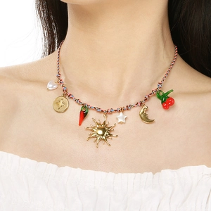 Bohemian woven rope necklace with colorful charms like sun, heart, and cherry pendants