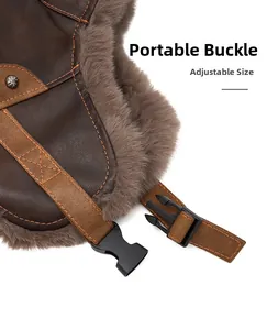Detail view of the brown PU leather aviator hat showing the adjustable buckle and strap