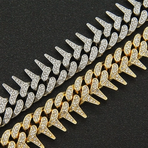 Iced out Cuban link bracelet for men with spikes in silver and gold finish with crystals