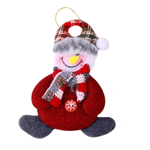 Plush Christmas snowman hanging ornament with snowflake button and striped scarf on white background