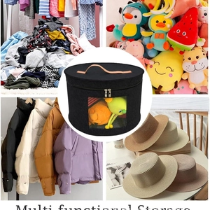 Portable round black felt hat box with handle, double zippers, and transparent PVC window