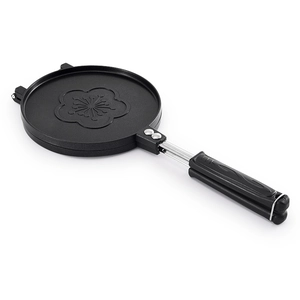 Commercial gas egg roll maker with embossed flower pattern on black non-stick plates