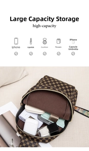 Detail showing internal storage space and ethnic woven strap of this retro crossbody chest bag