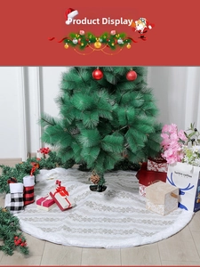 Detail of 48 inch knitted Christmas tree skirt with plush trim and wavy snowflake pattern