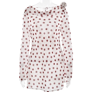 Elegant white chiffon polka dot dress with long sleeves and a shoulder floral detail