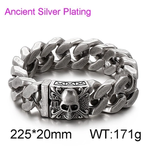 Detail view of silver Cuban chain bracelet with skull clasp and product specifications