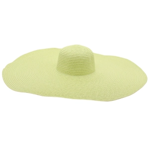 Macro view of wide wavy lime green straw hat texture and detailed woven pattern