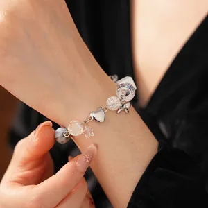 Chic beaded bracelet with silver butterfly, heart mirror charm and star pendants for women