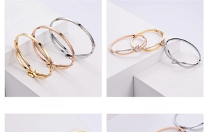Detail of butterfly bangle with snap closure and high-quality real gold plating