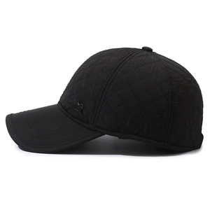 Winter baseball cap for men with diamond quilted pattern and warm ear protection