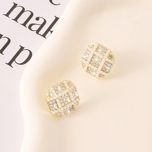 Square gold stud earrings with white pearls and sparkling rhinestones in a grid design