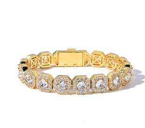 Macro detail of gold-plated octagonal links with sparkling zircon stones and secure clasp