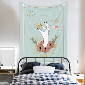 Detail of Leo zodiac tapestry featuring a sun hand and floral galaxy patterns for wall decor