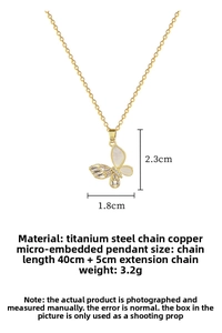 Detailed view of butterfly necklace with shell wing, cubic zirconia, and 45cm chain