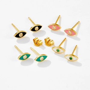 Detailed macro view of S925 sterling silver eye-shaped stud earrings in four vibrant colors