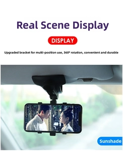 Close-up of rotatable car phone holder mounted on sun visor with 360-degree rotation ball joint