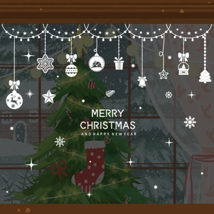 Detailed white Christmas window stickers with snowflakes, bells, and reindeer motifs